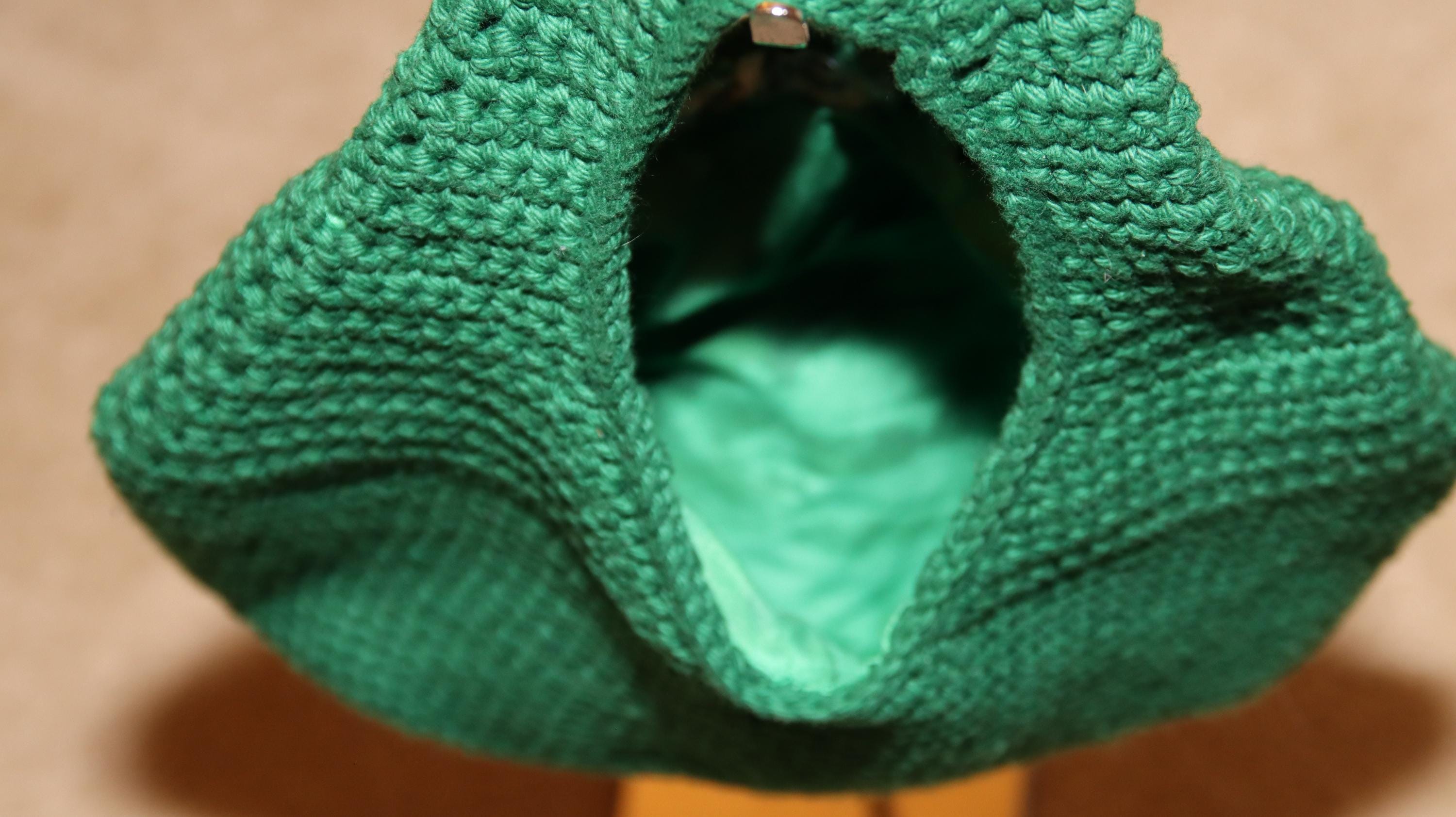 Close up of top of purse with view of lining